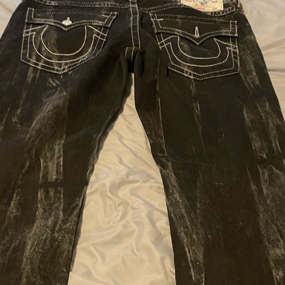 True religion brand jeans these were designed like this. Rarely worn